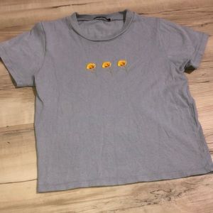 Brandy Melville light blue embroidery flowers top